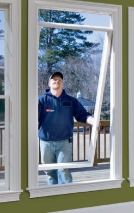 McCauley Worker Replacing Glass